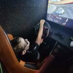 The Racing Simulator Action in the Gaming Bus Colchester